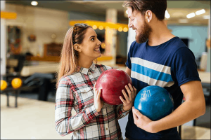 A couple choosing bowling for second date